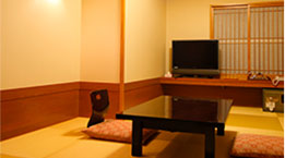 A modern, Japanese-style room (18.2 sqm) with a bedroom